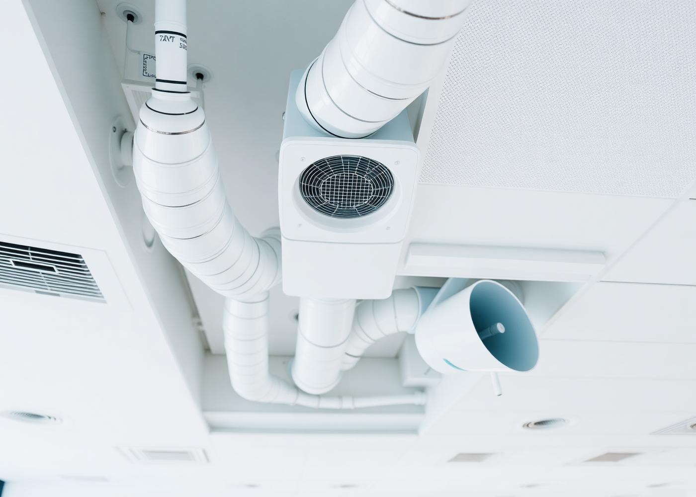 Modern ventilation ductwork installed in a commercial ceiling